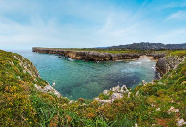 Guadamia beach (or Aguamia) rocky coast summer scenery. Asturias, Spain.