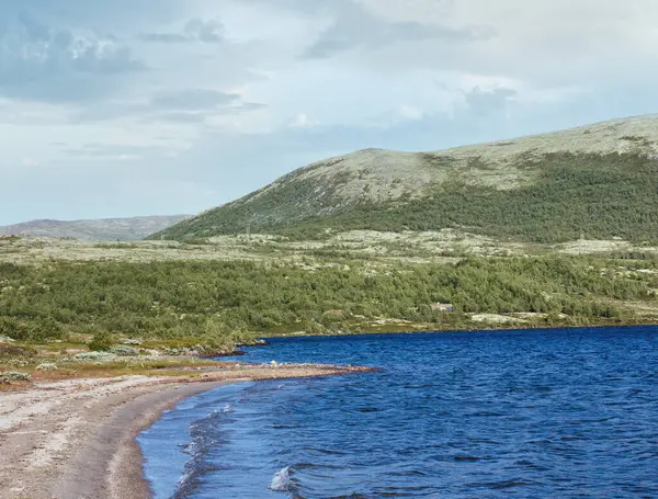 stock image Small mountain lake (not far from Dombas, Norge)