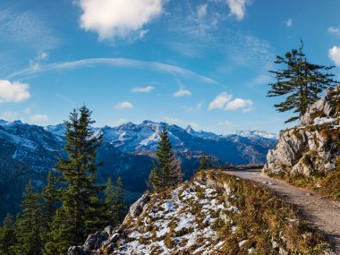 Autumn Alps mountain misty morning view from Jenner Viewing Platform, Schonau am Konigssee, Berchtesgaden national park, Bavaria, Germany.  Picturesque traveling, seasonal and nature beauty scene.