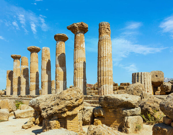 Ruined Temple of Heracles columns in famous ancient Valley of Temples, Agrigento, Sicily, Italy. UNESCO World Heritage Site.