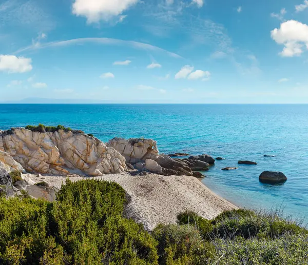 stock image Summer morning sandy beach and rocky coast near Platanitsi Beach (Sithonia Peninsula, Chalcidice, Greece).