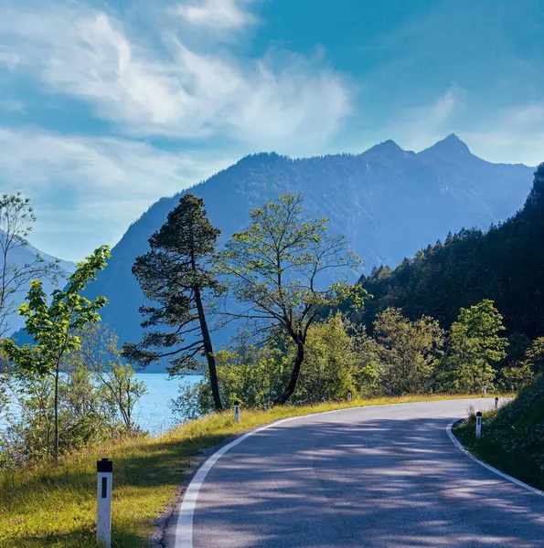 Stock image Plansee lake summer landscape with  road and down from the trees (Austria).