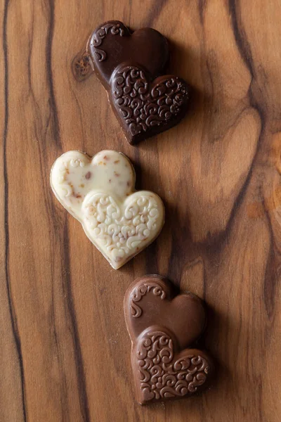 Close Heart Shaped Chocolates Wooden Cutting Board —  Fotos de Stock