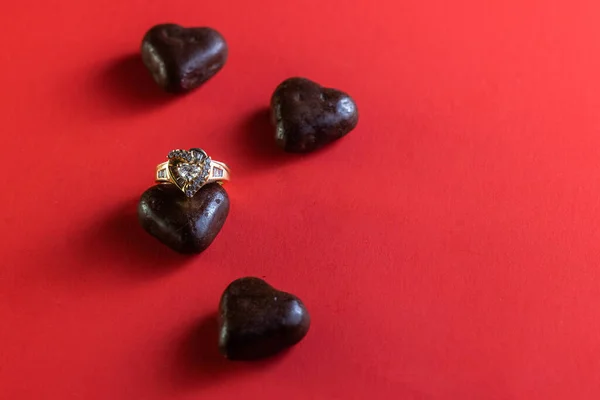 Heart Shaped Dark Chocolates Red Background Holidays — Φωτογραφία Αρχείου