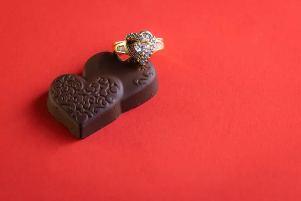 Heart Shaped Dark Chocolates Red Background Holidays — Φωτογραφία Αρχείου