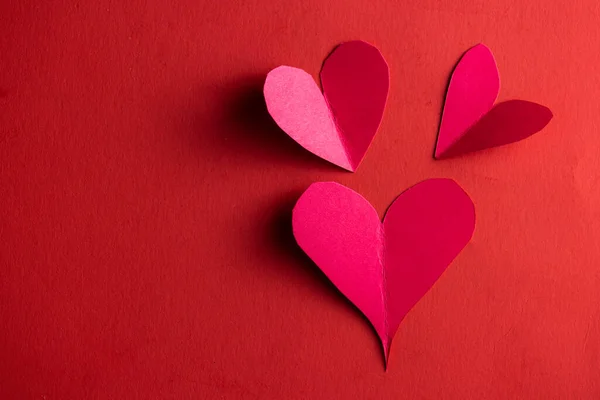 Hand Cut Hearts Out Red Paper Red Background — Stockfoto