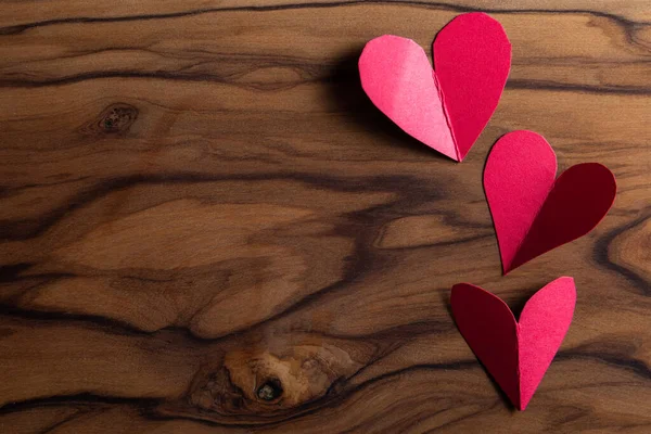 Close Small Heart Shaped Cut Outs Wooden Table Beautiful Texture — Foto de Stock