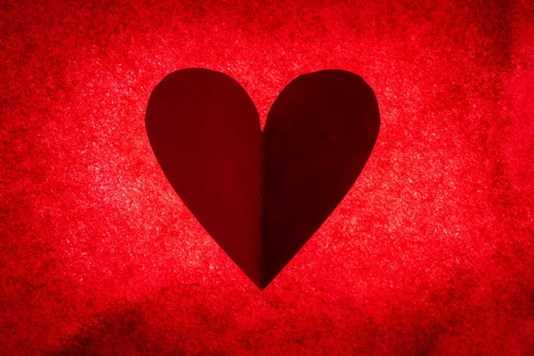 Hand Cut Heart Bright Red Back Lite Background — Stock fotografie