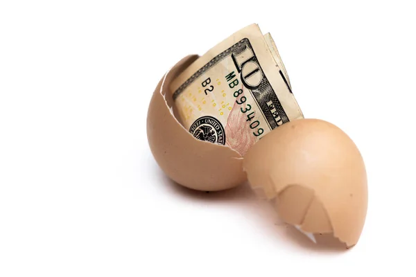 Concept Image Using Dollar Bill Cracked Egg White Background — ストック写真