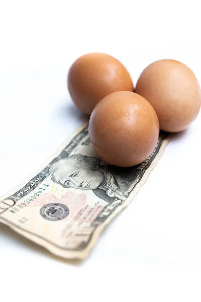 Fresh Eggs Top Dollar Bill White Background — ストック写真