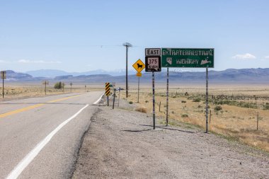 Warm Springs, Nevada/USA - May 12 2023: Close up of the sign for highway 375 or the famous Extraterrestrial Highway in the nevada desert. clipart