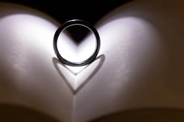 abstract shadow from a circular ring representing love and affection