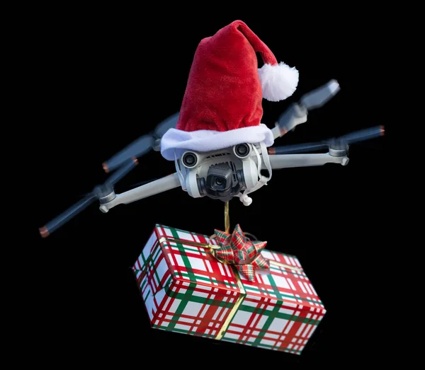 Drone Concept Het Dragen Van Een Santa Hoed Het Houden — Stockfoto