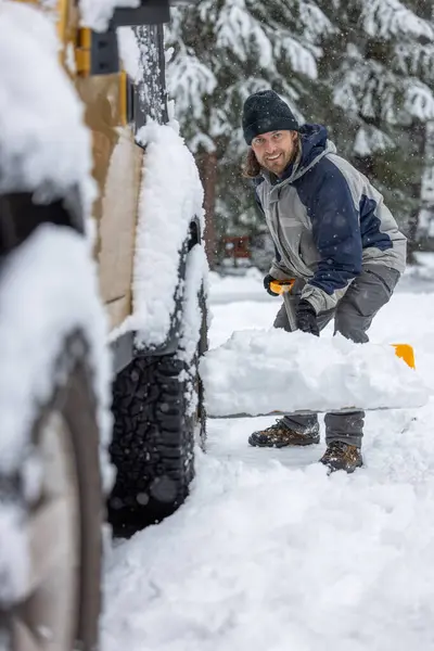 Man Black Hat Blue Jacket Shoveling Snow Back Truck — Stock Photo, Image