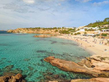 Aerial drone view of a beautiful coast and sea in Cala Tarida, Ibiza island, Spain clipart