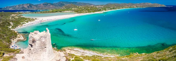 stock image Aerial done panoramic view of Porto Giunco beach and tower in Villasimius, Sardinia, Italy