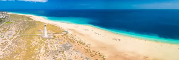 stock image White sandy beach and blue water in Morro Jable, south of Fuerteventura, Canary islands, Spain