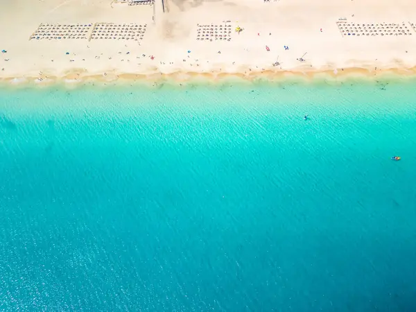 stock image White sandy beach and blue water in Morro Jable, south of Fuerteventura, Canary islands, Spain