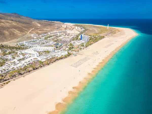 stock image White sandy beach and blue water in Morro Jable, south of Fuerteventura, Canary islands, Spain