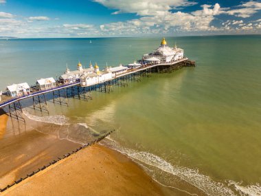 Eastbourne Beach and Pier on sunny day, East Sussex, UK clipart