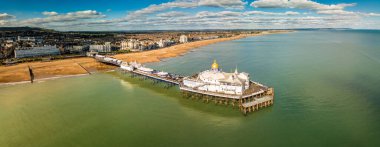 Eastbourne Beach and Pier on sunny day, East Sussex, UK clipart