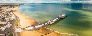 Eastbourne Beach and Pier on sunny day, East Sussex, UK clipart