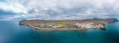 Aerial drone view of Las Playitas fishing town and the beach, Fuerteventura, Canary Islands, Spain clipart