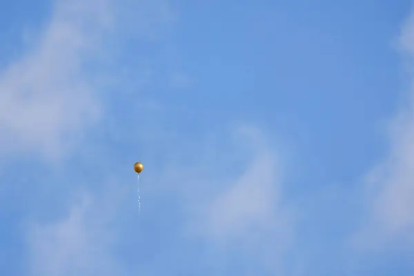 stock image a decorative balloon floating in the sky