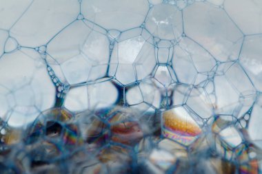 Yanardöner yüzeyli sabun köpüğü kütleli soyut arkaplan