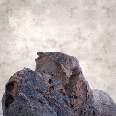 textured stylish old paper background, square, with landscape of Gran Canaria, around the Dog of Bentayga rock formation  clipart