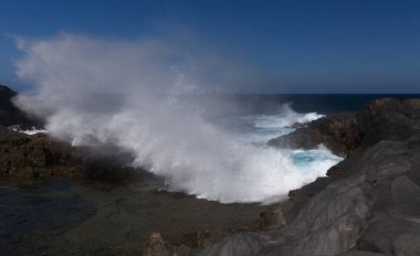 Gran Canaria, views around salt evaporation ponds Salinas el Bufadero close to a blowhole Bufadero in the coast of Arucas municipality clipart