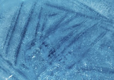 İçinde küçük yuvarlak hava kabarcıkları olan buz dokusu. 