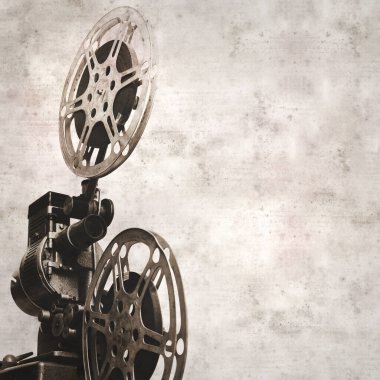 eski film projektörüyle kare şeklinde desenli eski kağıt arkaplan