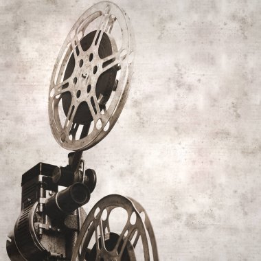 eski film projektörüyle kare şeklinde desenli eski kağıt arkaplan