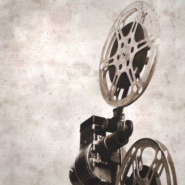 eski film projektörüyle kare şeklinde desenli eski kağıt arkaplan