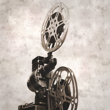 eski film projektörüyle kare şeklinde desenli eski kağıt arkaplan