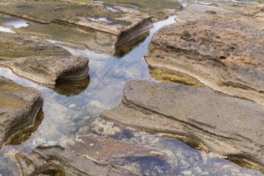 Gran Canaria, textures of the rocks of El Confital beach on the edge of Las Palmas de Gran Canaria, low tide