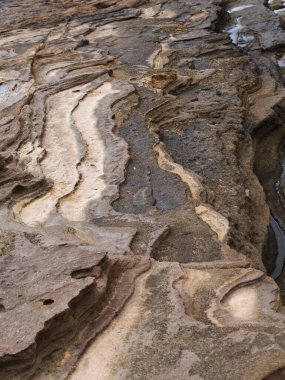 Gran Canaria, textures of the rocks of El Confital beach on the edge of Las Palmas de Gran Canaria, low tide