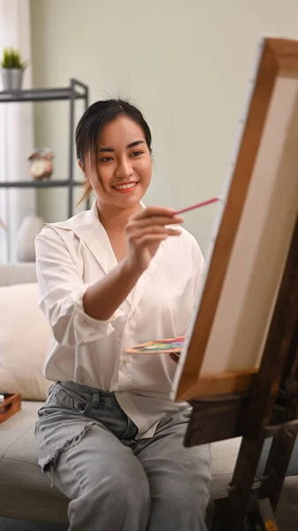 Happy Female Painter Painting Easel Watercolor Living Room Leisure Activity — Stock Photo, Image