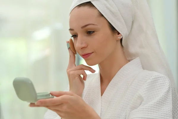 Beautiful Woman Cushion Puff Mirror Applying Makeup Powder Foundation Her — стоковое фото
