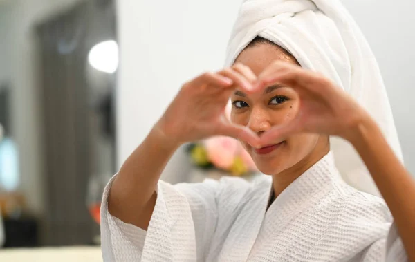 Attractive Woman Bathrobe Towel Head Doing Heart Symbol Shape Hands — стоковое фото