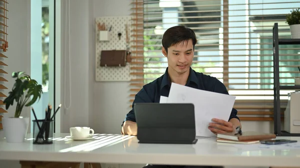 Handsome Millennial Businessman Using Digital Tablet Managing Company Investment Home — Fotografia de Stock