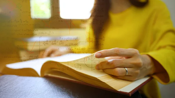 Young woman studying for exam, solving math problems to practice with formula, equation mathematical symbol on foreground.