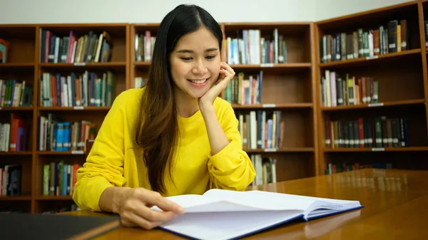 Pleased Female Student Reading Book Library Studying Research Education Learning — Stock Photo, Image