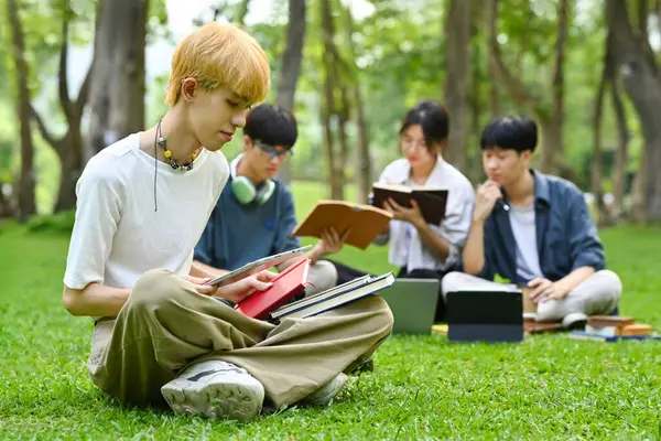 Asian Male Student Sitting Green Grass Campus Friends Sitting Background — Stock Photo, Image