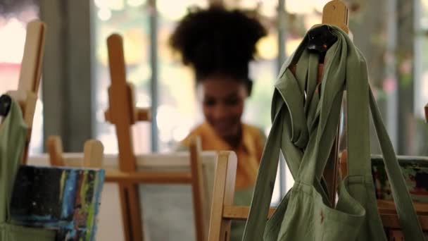 Shot Slow Motion Apron Artist Canvas Wooden Easel Female Artist — стокове відео