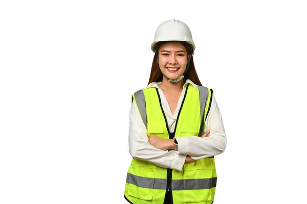 白い背景で隔離された黄色いベストおよび安全堅い立っていることを身に着けているエンジニアの女性 — ストック写真