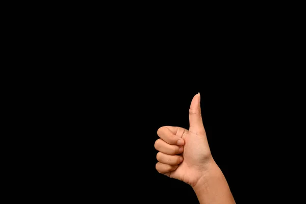 黒い背景に対する親指を示す女性の手 Okと平和の兆候 — ストック写真