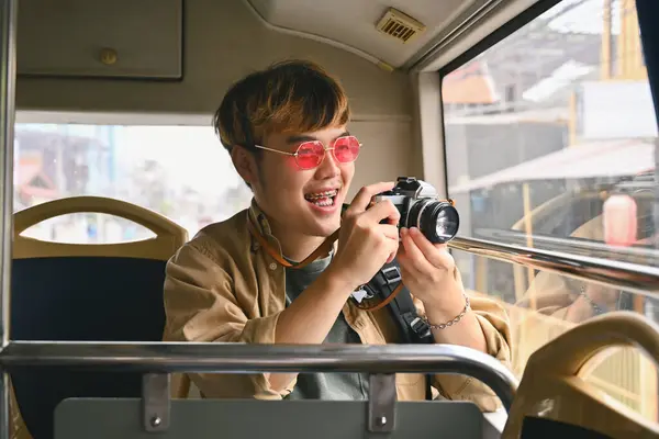 Cheerful Man Tourist Pink Glasses Holding Camera Enjoying Travel Bus — Stock Photo, Image