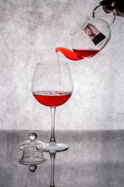 Pouring Wine Teapot Glass Gray Background — Stock Photo, Image